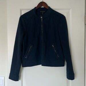 This is a Banana Republic fabric zip-up jacket